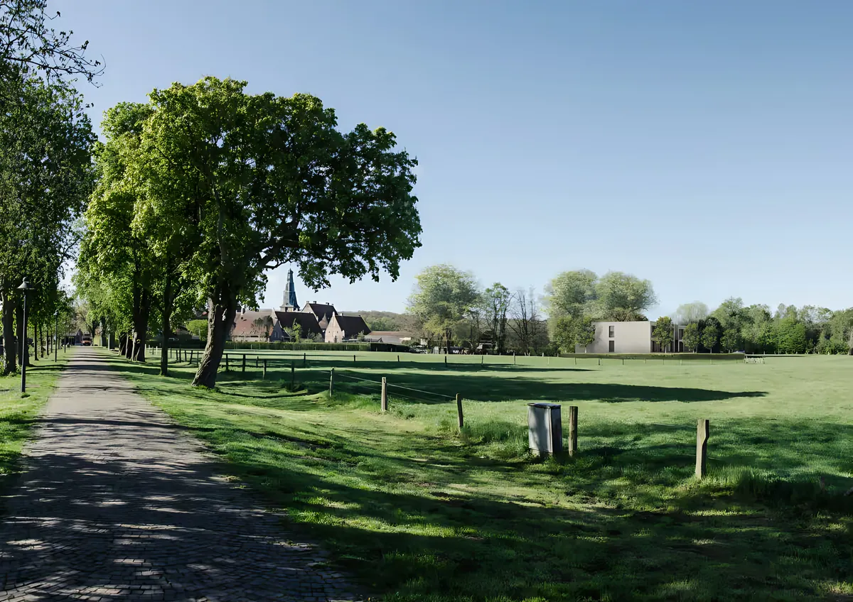 Tree-lined avenue along the meadows of the castle complex